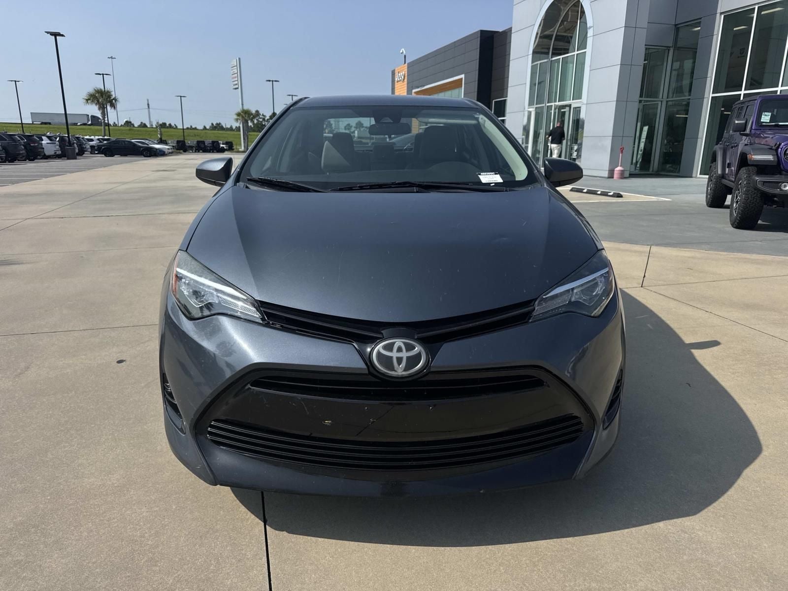 Used 2017 Toyota Corolla LE with VIN 5YFBURHE9HP634930 for sale in Gulfport, MS