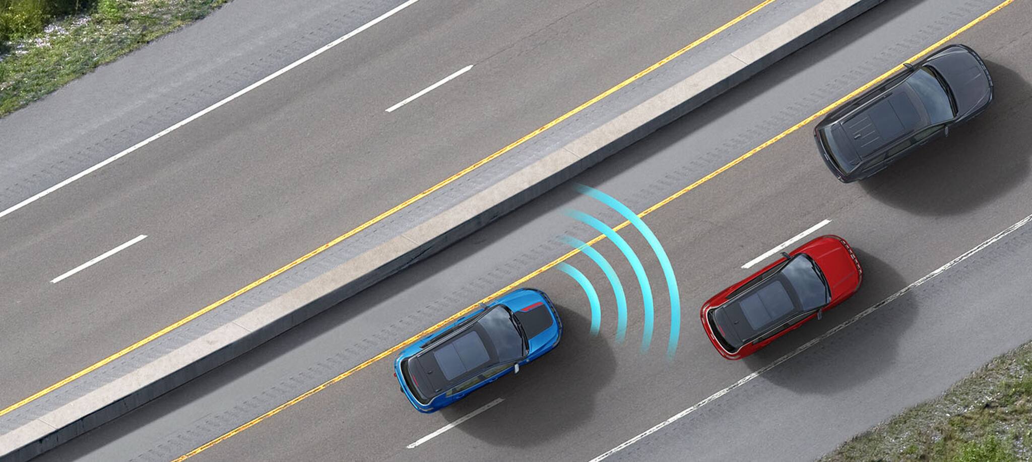 an suv showcasing safety features while driving on the highway