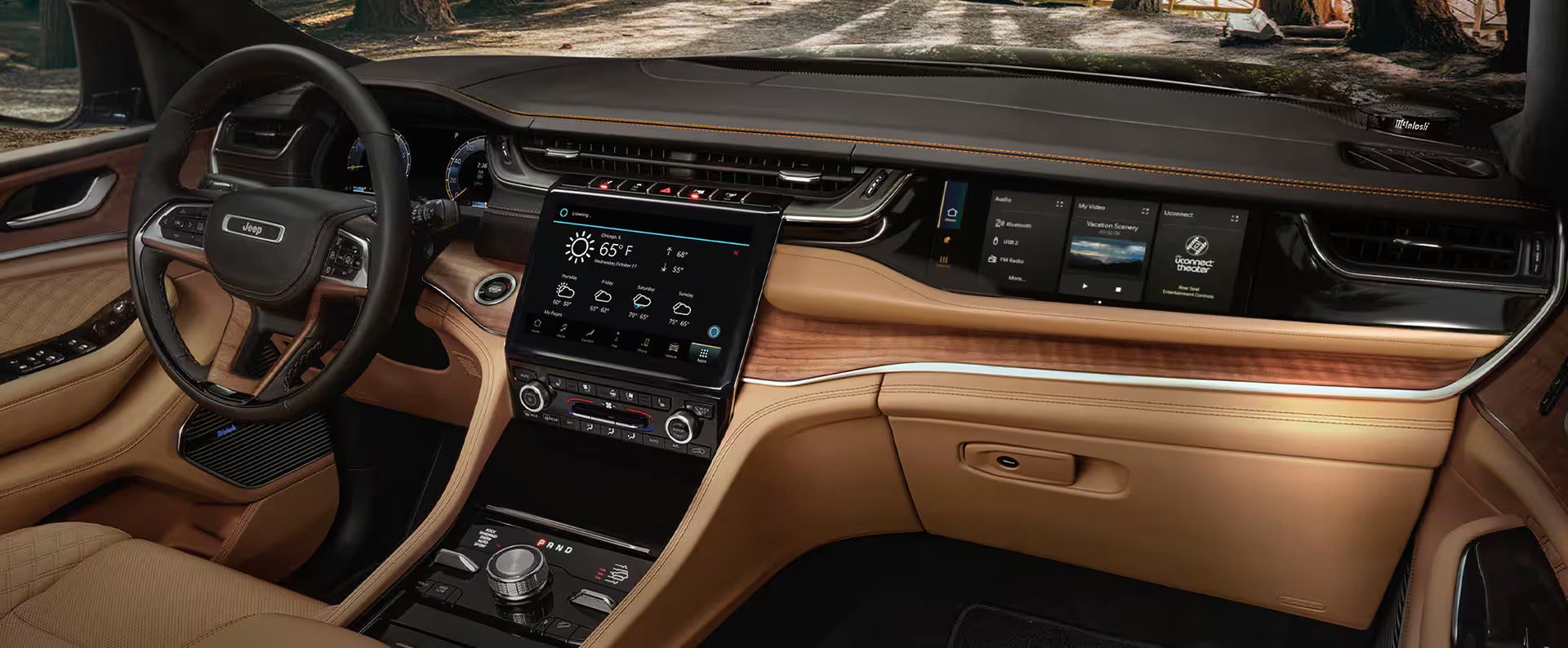 the digital cluster display, infotainment system and passengers display on a jeep grand cherokee
