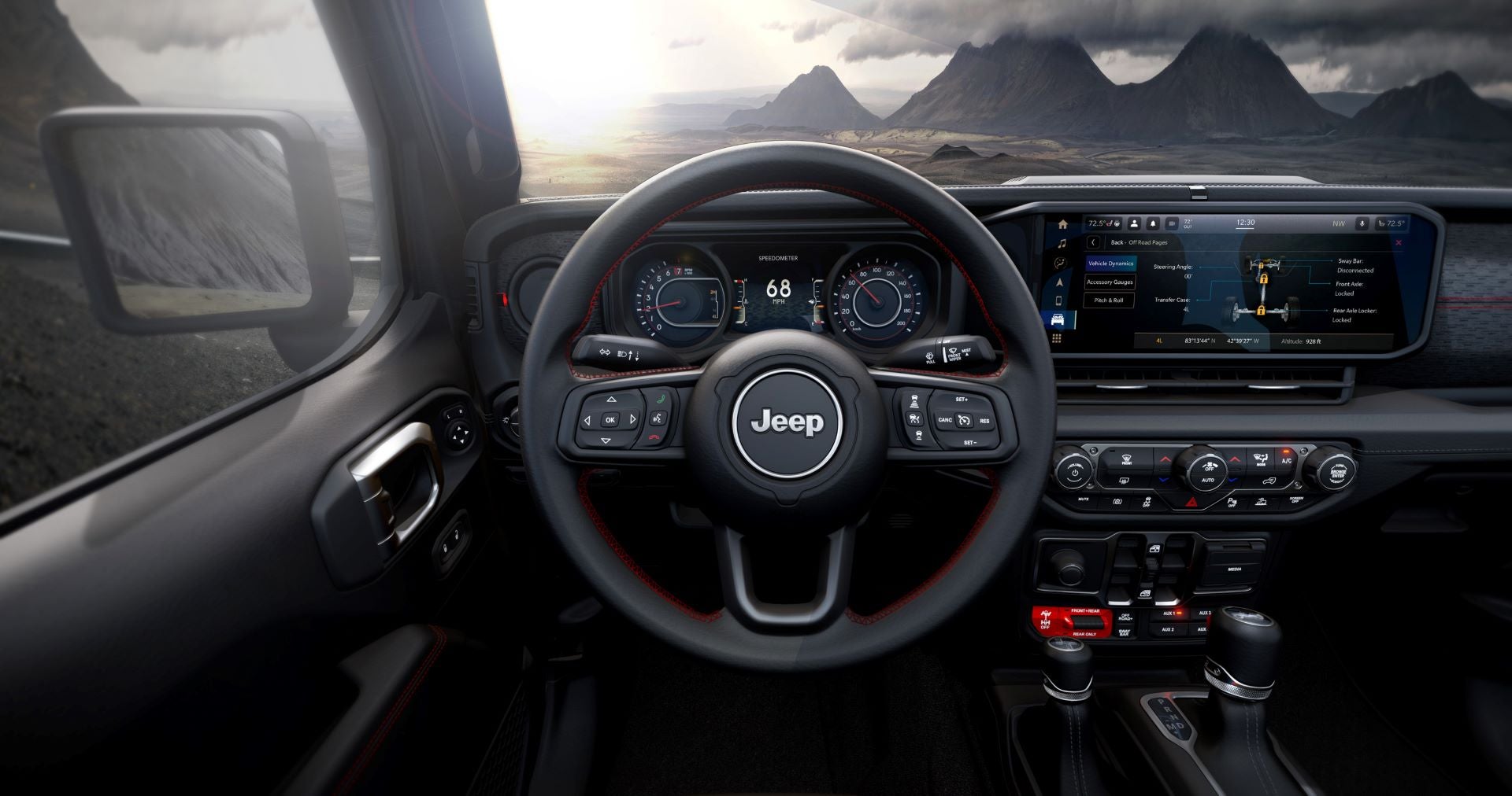the front drivers wheel and digital display of a jeep wrangler