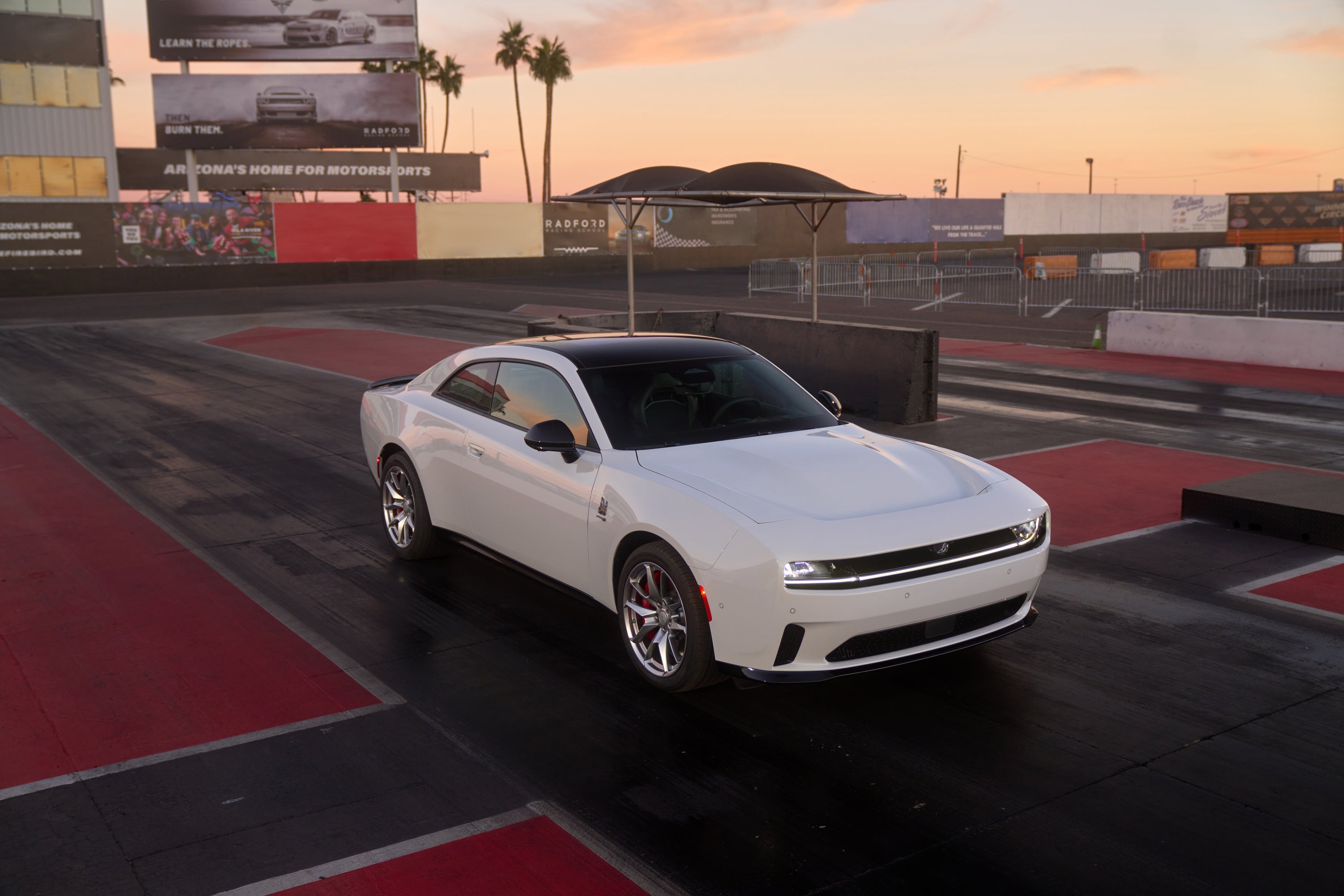 A white cra sitting parked.