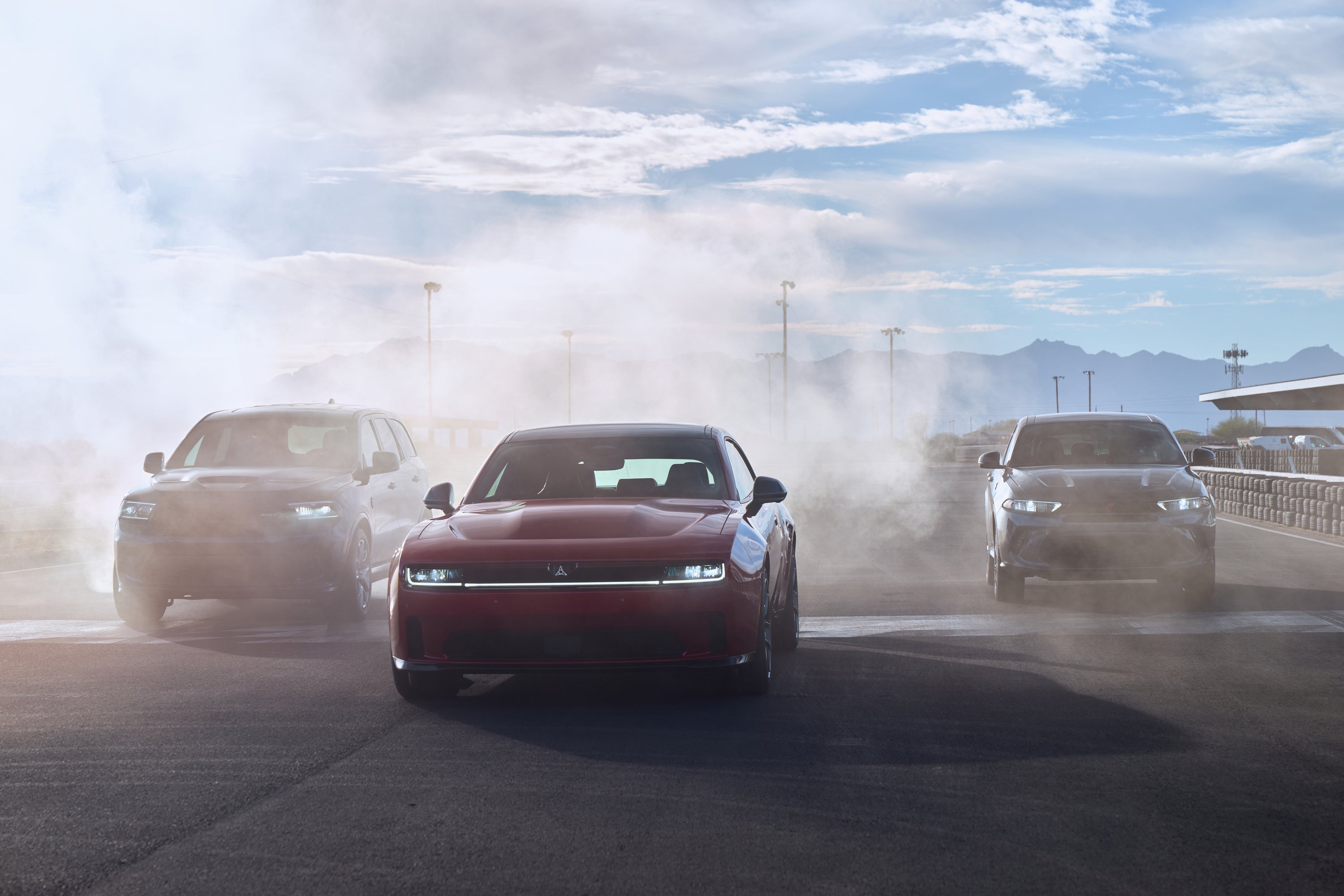A blue car sitting parked.