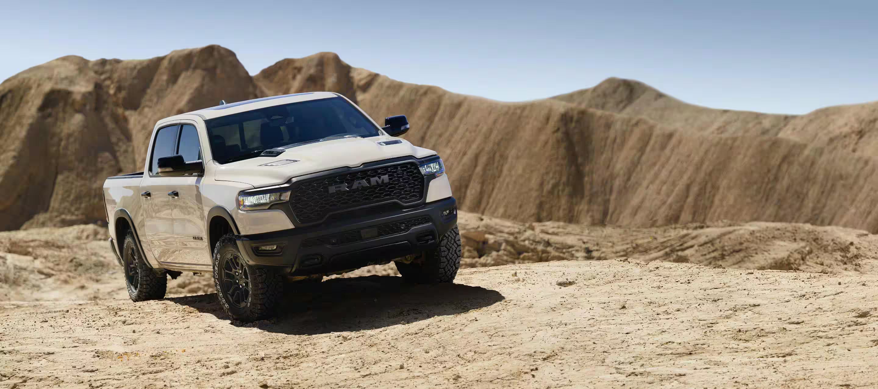 a white truck in the desert